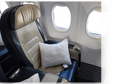 Brown passenger seat inside a plane
